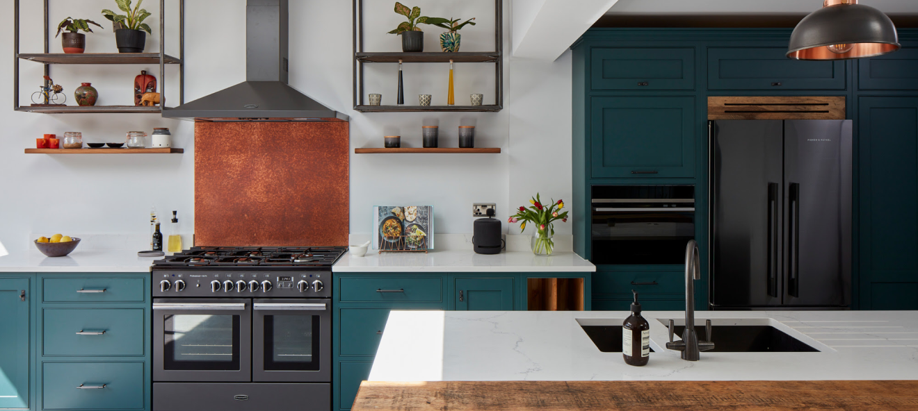 luxury kitchen with teal cabinetry and large island